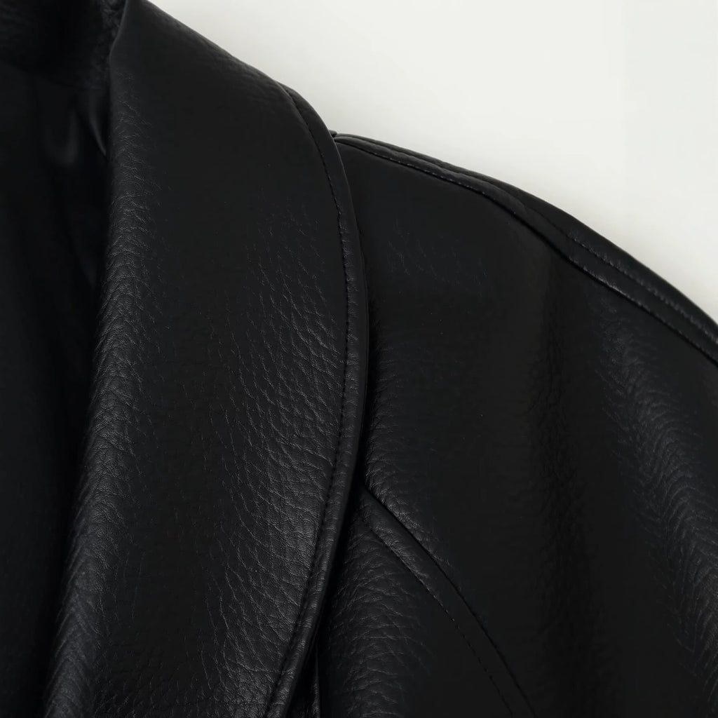 Wearing a PU leather jacket with a belt for women
